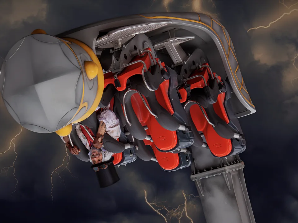 Close view of Crealy ride seats with over-the-shoulder restraints