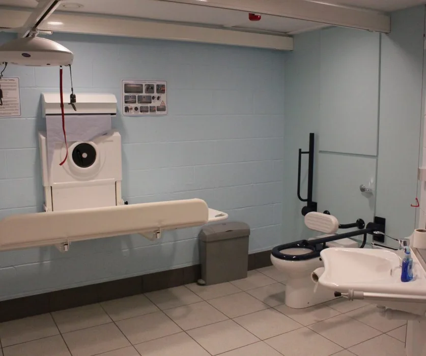 Changing Places toilet at Eureka! with an adult changing bench, hoist and accessible toilet