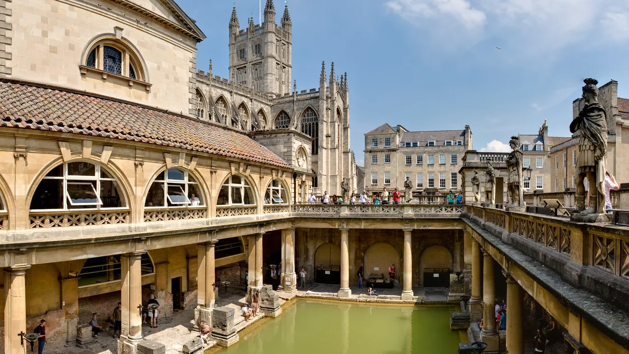 The Great Bath and surrounding historic buildings in Bath
