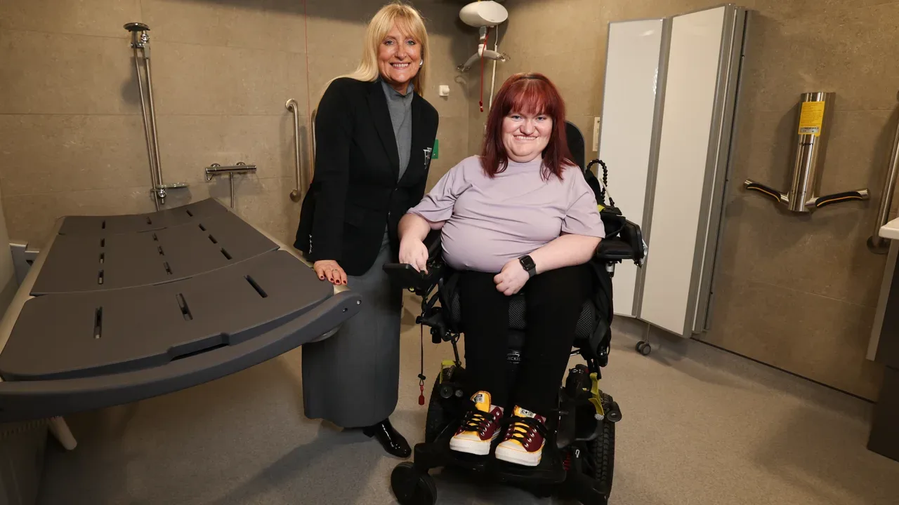 Titanic Belfast chief executive Judith Owens and disability-rights activist Michaela Hollywood in the Changing Places room