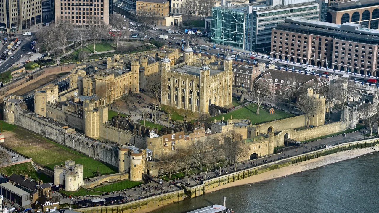Aerial view of the Tower of London beside the River Thames